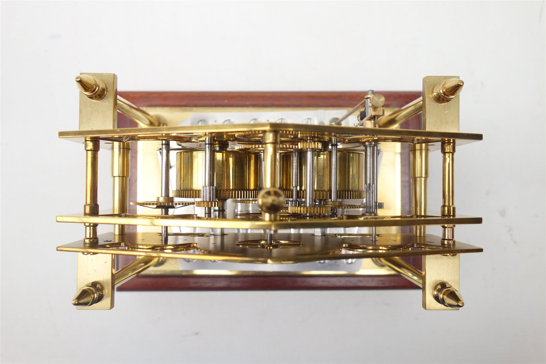 Devon Clocks Congreve type brass 'Rolling Ball' clock, with Arabic