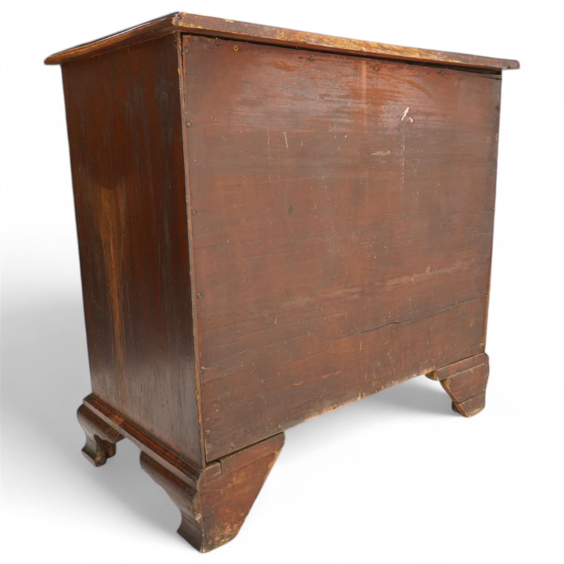 George III mahogany chest, moulded rectangular top over five long cock-beaded drawers, each fitted with brass swan neck handles and circular plates, with shaped brass escutcheons, lower moulding over ogee bracket feet 