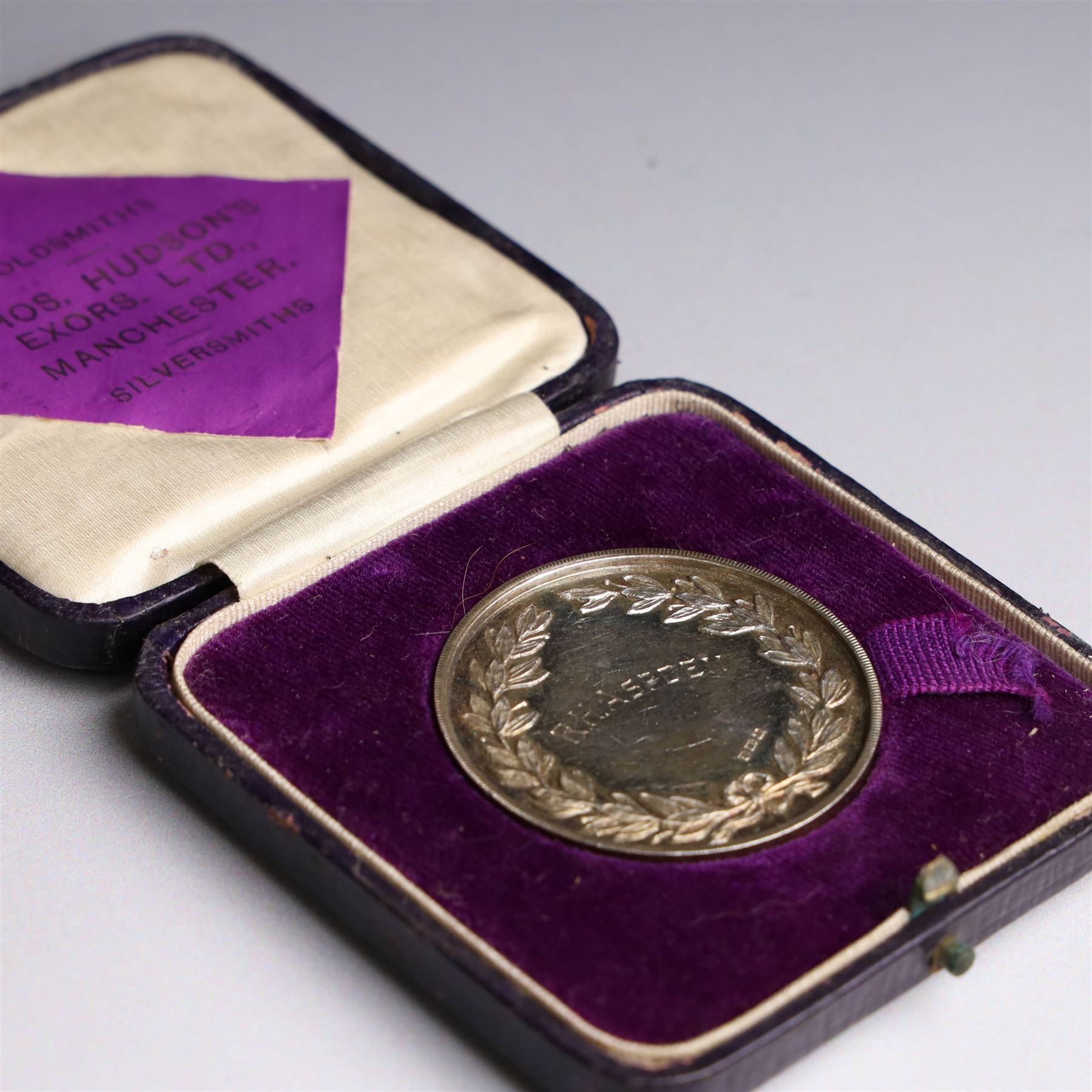 Collection of silver medals, mainly with an agricultural theme, including Poultry Club, Heywood Bicycle Club, heart shaped fob, four within leather cases 