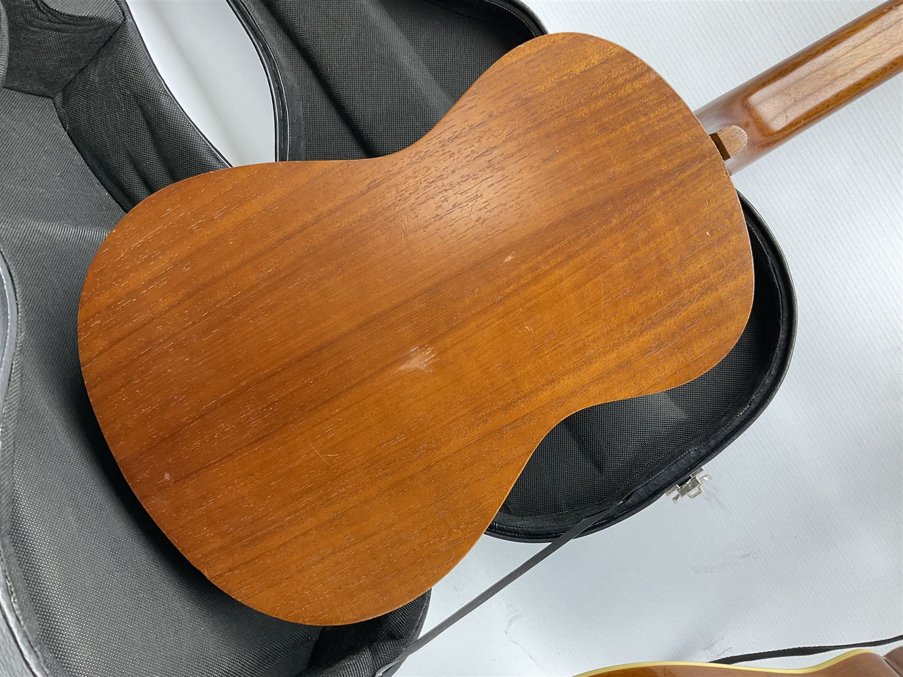 Palmer eight-string mandolin with mahogany back, simulated ivory and mother-of-pearl mounts L67cm; and Mahalo mahogany cased baritone scale ukulele, model no.U320B, L76cm; in hard carrying case (2)