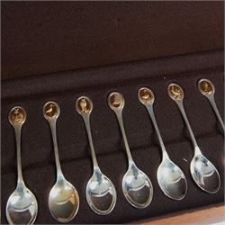 Royal Society for The Protection of Birds silver spoon collection, twelve spoons each inset with a silver-gilt bird cameo, hallmarked John Pinches Ltd, London 1975, in wooden presentation case with certificate of authenticity