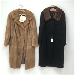 A Ladies light brown Musquash fur coat, together with a faux fur example, and another coat with fur collar. 