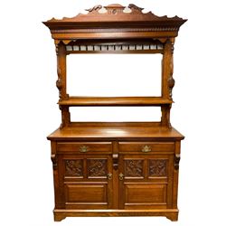 Edwardian oak mirror back sideboard, raised shaped pediment carved with acanthus leaves over Greek key frieze, bevelled mirror back, fitted with two drawers and two cupboards