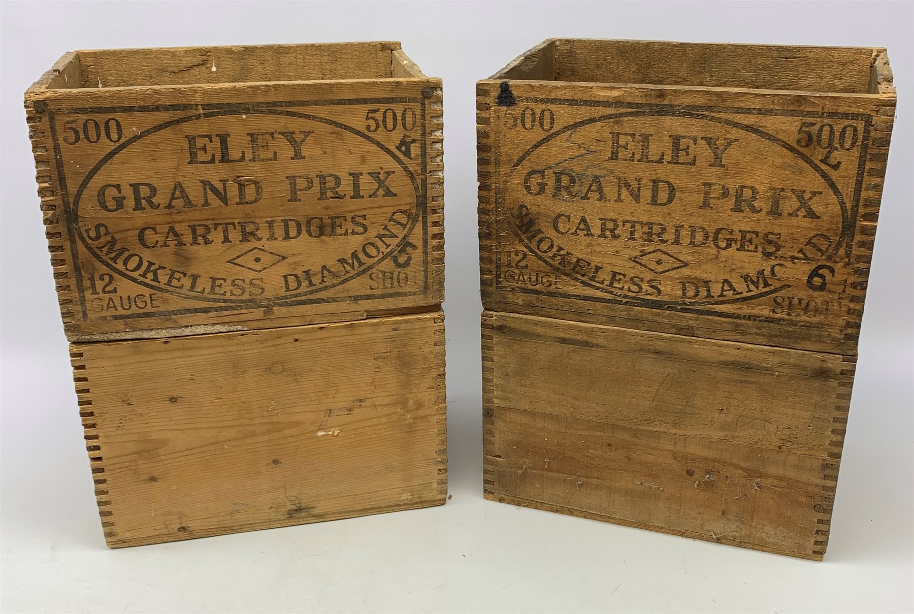 Four vintage Eley cartridge wooden crates each with stencilled decoration 35 x 24 x 23cm; now containing old used metal cartridges and caps etc (4)