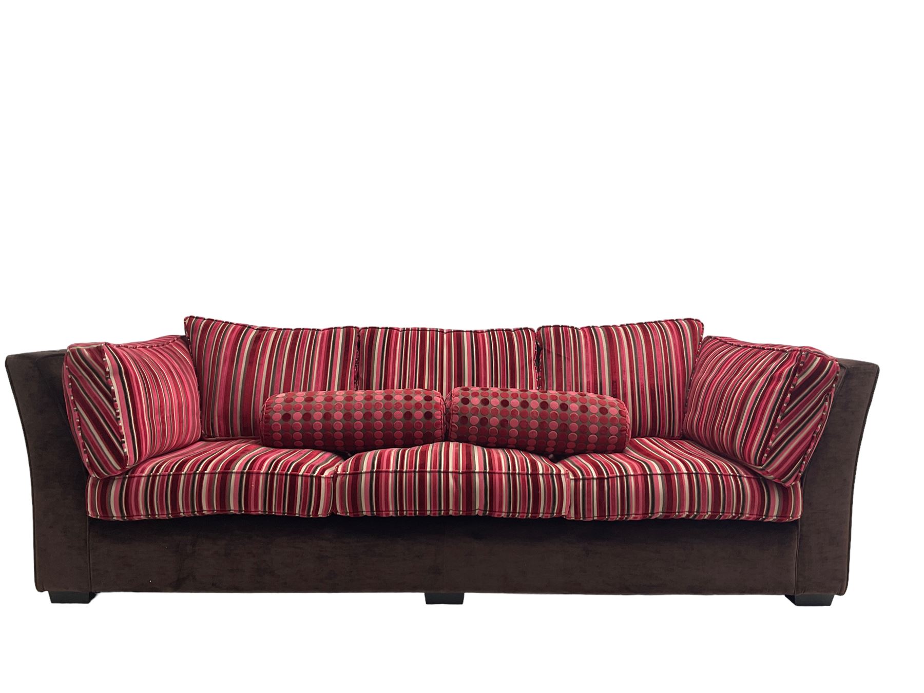 Collins & Hayes - grande three seat sofa upholstered in chocolate fabric, the loose cushions upholstered in textured fuschia stripes with contrasting spotted bolster cushions
