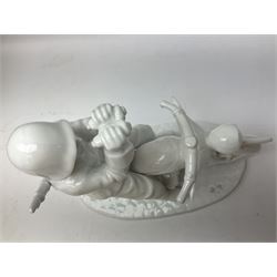 Neundorf figure modelled as a soldier seated upon a stationary motorcycle looking through binoculars, with printed mark beneath, H23cm