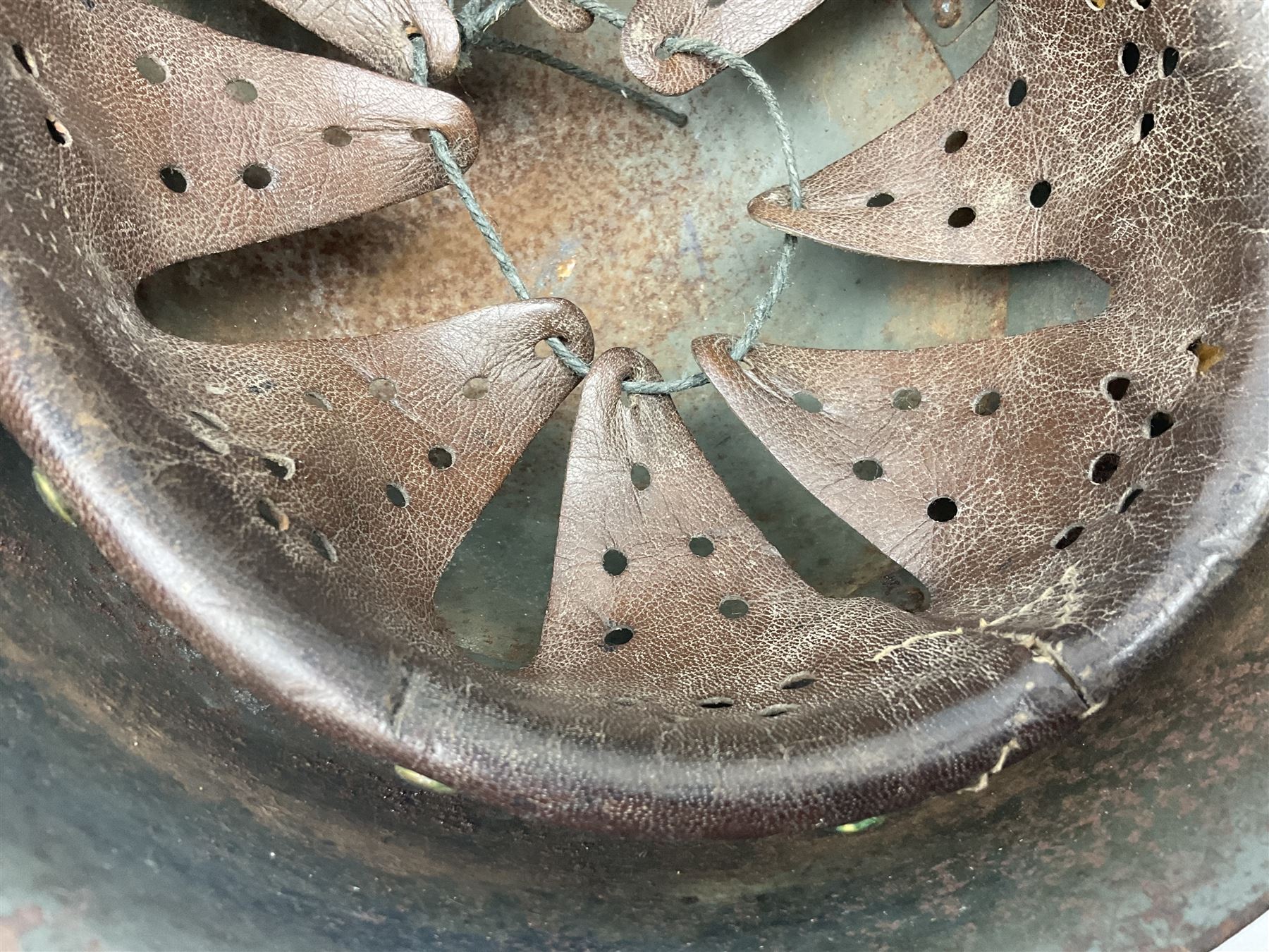 WWII Italian steel helmet with liner and chin strap