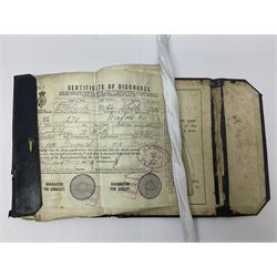 WWI pair of medals comprising British War Medal and Victory Medal awarded to 32682 Pte. W. Meadows W. Rid. R. in issue box; WWI pair of medals comprising 1914-15 Star and Victory Medal awarded to 3720 Pte. (later Cpl.) E. Petty W. York. R. with issue letter from Tank Corps; WWII group of five medals comprising 1939-45 War Medal, Defence Medal and 1939-45, Italy and Africa Stars; all with ribbons; and book of nineteen seaman's Certificates of Discharge to cook Charles Filburn 1893 - 1901 from various British ports