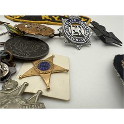 Collection of military and similar enamel badges, pin badges, cloth badges and brasses