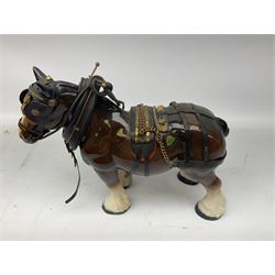 Four Melba Ware Shire horse figures and another similar, and three wood carts