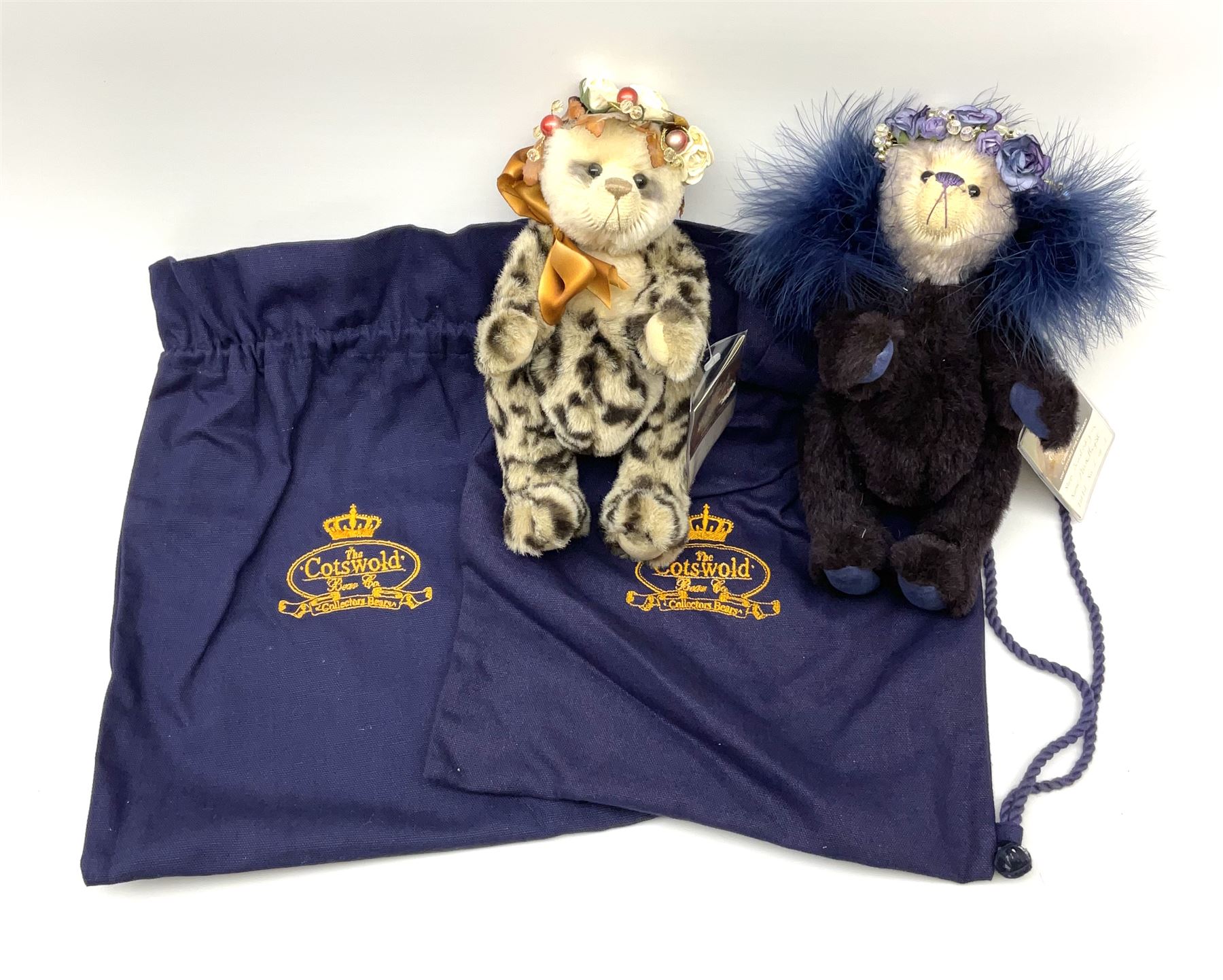 Two Cotswold Bear Company limited edition teddy bears in the Shop Exclusive series - 'Amethyst' No.1/1 with floral head garland H25cm; and 'Marianne' No.1/1; both with certificates and bags (2)
