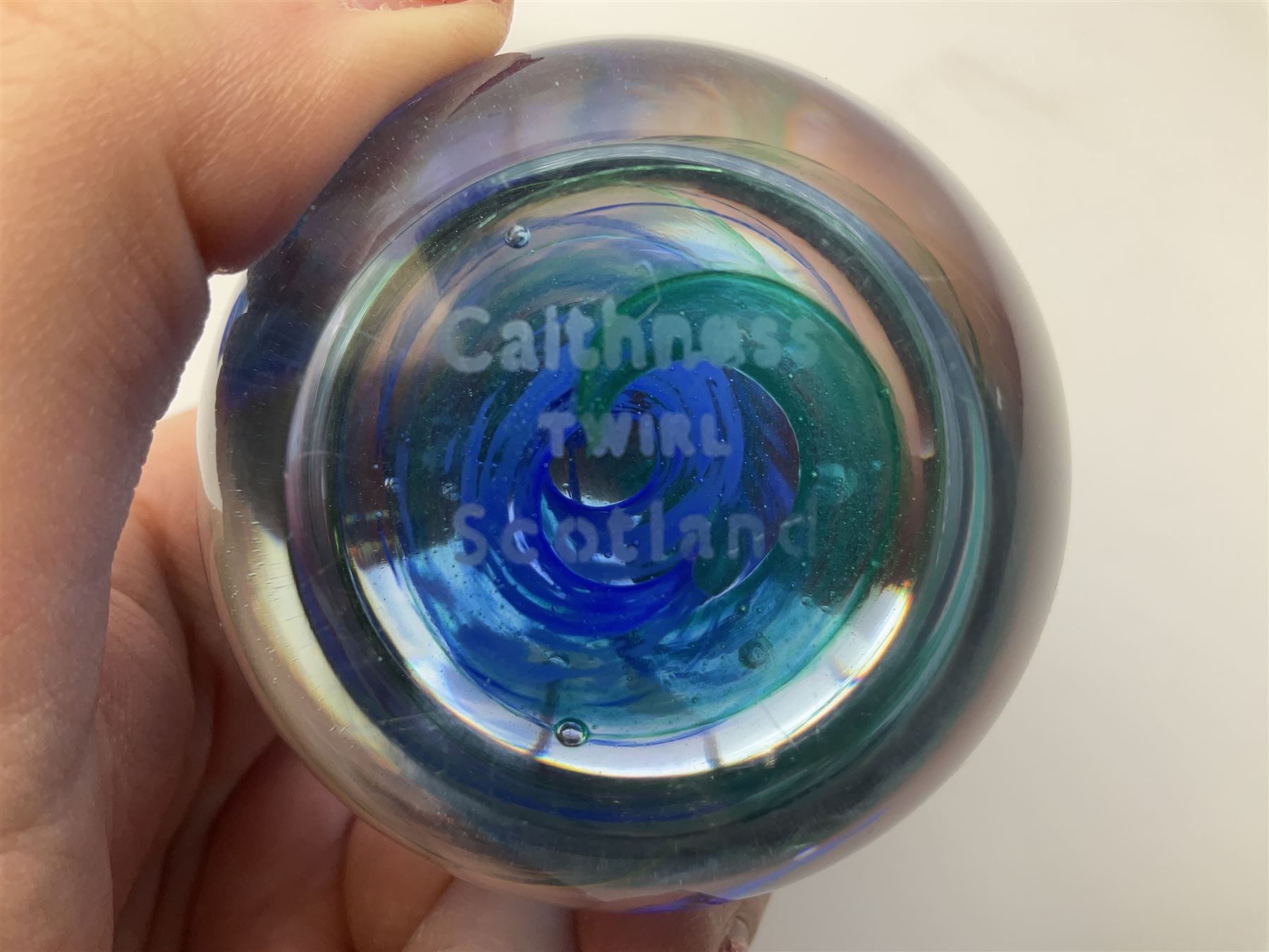 Caithness paperweights comprising 'Journey', 'Twirl', 'Blessings' and