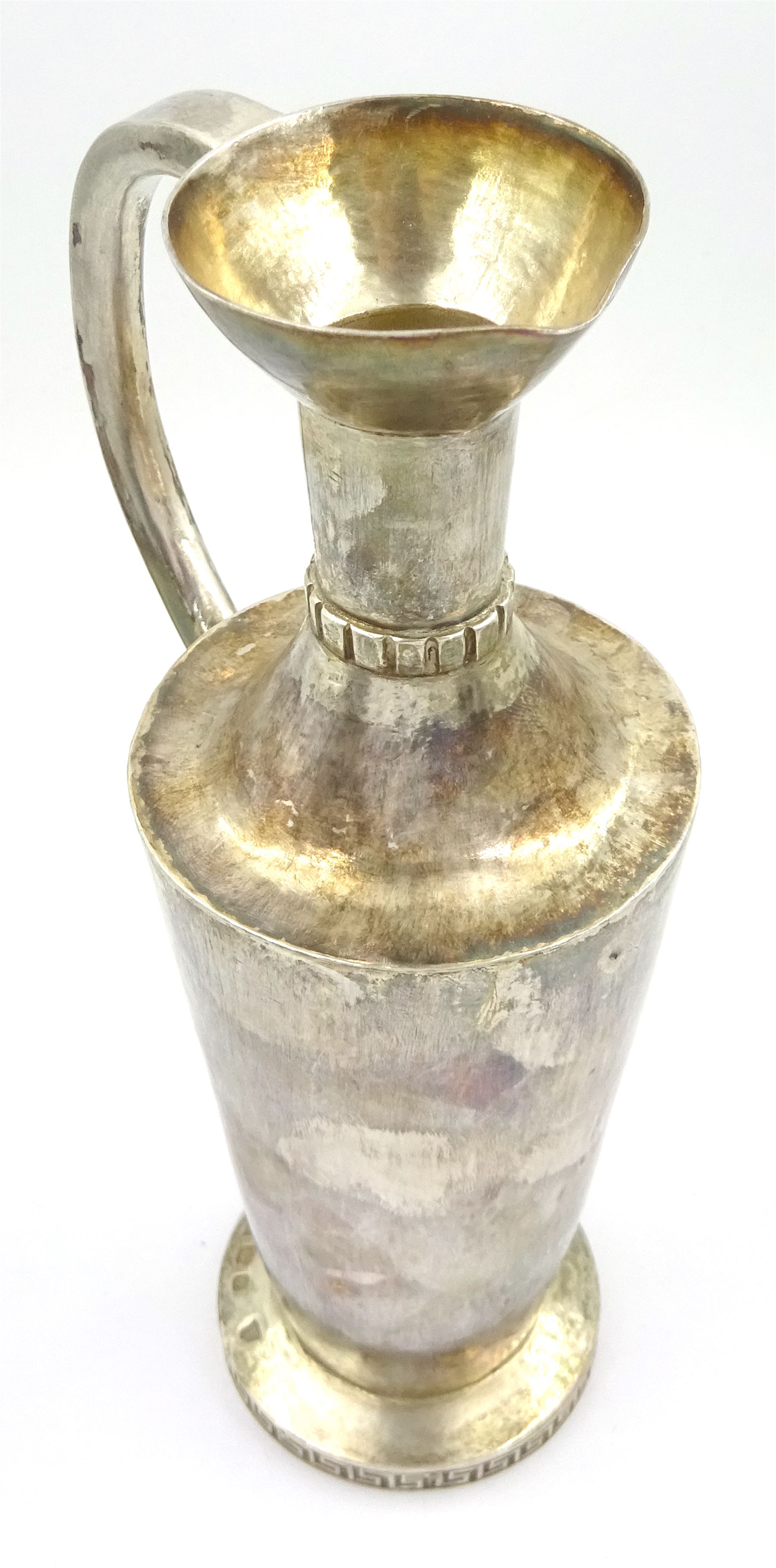 Modern Guild of Hull Silversmiths silver ewer, of tapering cylindrical form with waisted neck and C handle, upon a circular foot with key fret border, hallmarked J & K R, Birmingham 1990, also marked with the three crowns mark of the Guild of Hull Silversmiths, H20cm, approximate weight 7.16 ozt (223 grams)

Abraham Barachin was the last Hull silversmith to use the Hull mark of three ducal coronets in around 1706. 
However in 1983 the Assay Offices of Great Britain and the City of Kingston upon Hull granted the Guild of Hull Silversmiths permission to use the City's Coat of Arms as an additional mark on pieces they produced. 