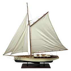 Wooden kit built model yacht with sails, mounted on wooden base, H86cm