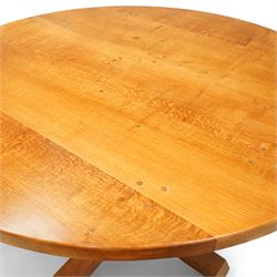 Rabbitman - circular oak dining table, adzed oak octagonal concave dining table, raised on a cruciform base, the supports and sledge feet also adzed, carved with rabbit signature, by Peter Heap of Wetwang