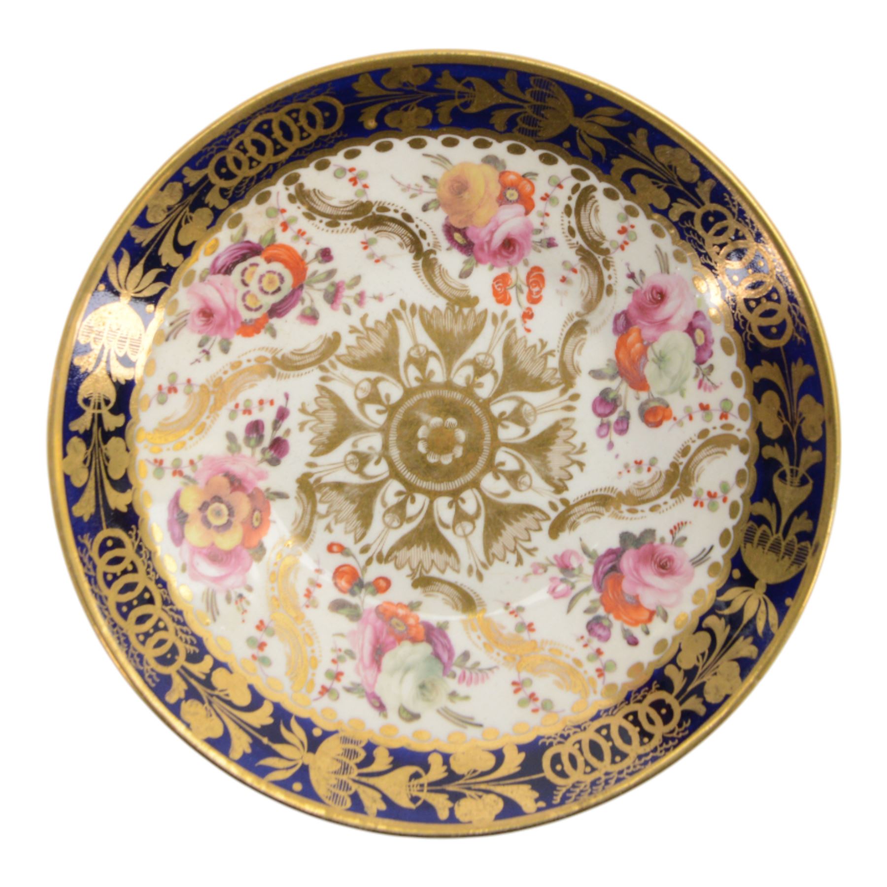 Coalport teawares, circa 1820-1840, comprising set of four trios, coffee cups, teacups and saucers, and slop bowl, decorated in the 830 pattern, with floral sprays and gilt shaped reserves, two further coffee cups and saucers, decorated with floral sprays upon blue grounds/with blue borders, and a similar coffee cup