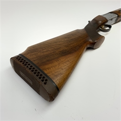 Italian 12-bore box lock ejector over-and-under double barrel shotgun, the walnut stock with chequered pistol grip and 76cm barrels, No.24299, L121cm overall SHOTGUN CERTIFICATE REQUIRED; together with two wall mounting gun security clamps with keys (3)