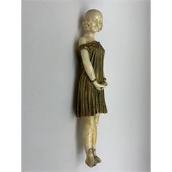 Demetre Chiparus (1886-1947): Innocence, a gilt bronze and ivory figure, circa 1925, standing in contemplative post with hands clasped, upon onyx plinth, signed to base, H24.4cm