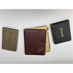 Three autograph albums and sketchbooks containing paintings, sketches, and verses