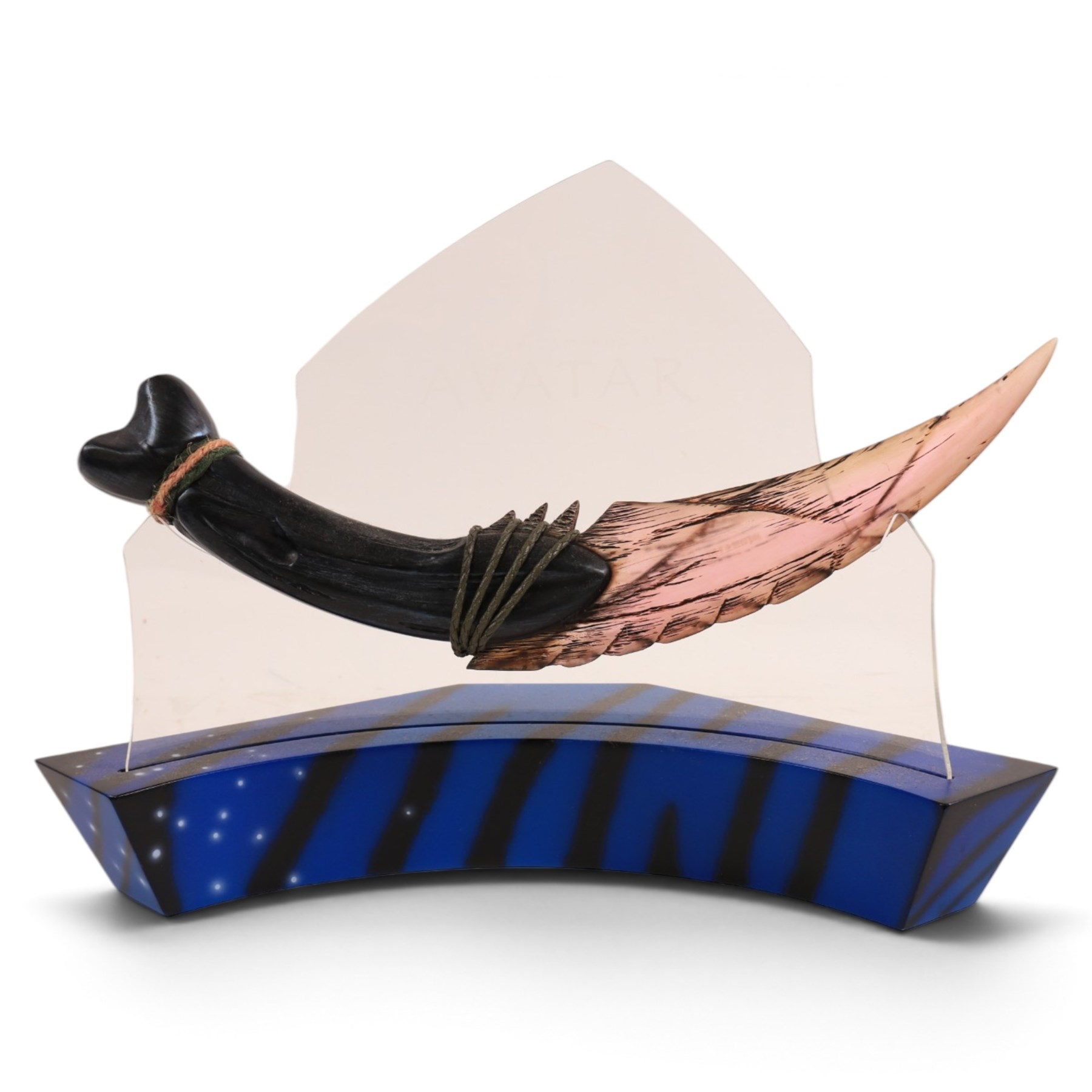 Two limited edition Gentle Giant Avatar 'Tsu'tey' Collectible Mini Busts, both boxed, together with an Avatar choker/bracelet and The Noble Collection Na'vi resin dagger replica on curved display stand