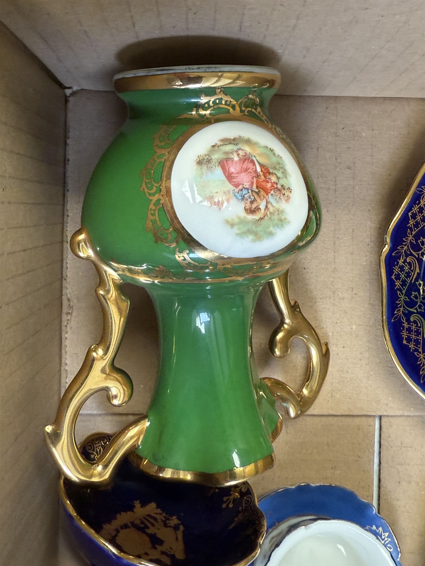 Collection of miniature Limoges and similar porcelain, including teacups and saucers, vases, comports, etc