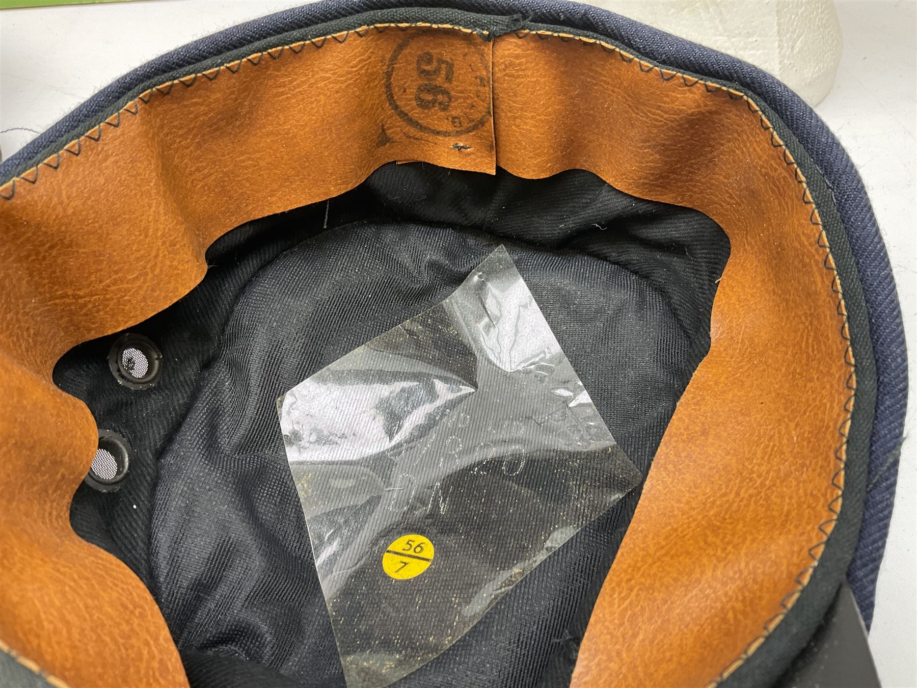 Black painted three colour railway lamp with revolving filters, H29cm; BR Acme Thunderer whistle; three railway peaked caps, two with BR Intercity 125 badge; small album of photographs of railway interest etc