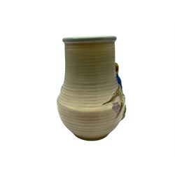 Clarice Cliff baluster jug moulded with a blue budgerigar perched upon branch with green rustic handle and mushroom glaze,  factory stamped beneath, H22.5cm