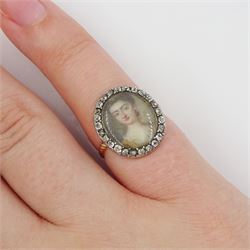 18th/ 19th century gold diamond portrait ring, set with an oval miniature of a woman on ivory, under a glazed panel, with old cut diamond surround and rope twist shank. This lot has been registered for sale under Section 10 of the APHA Ivory Act
