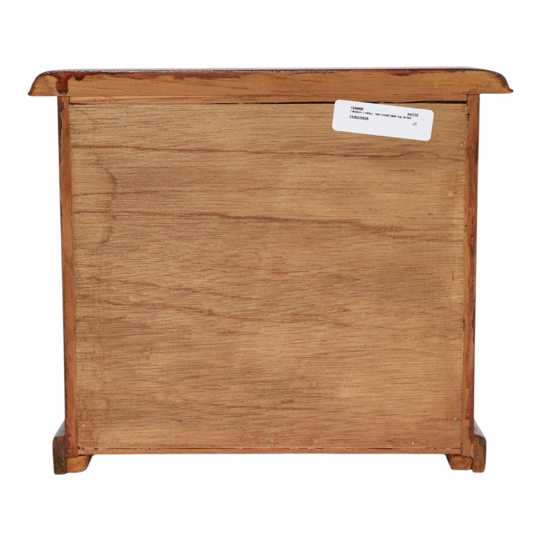 Table top chest of draws, fitted with three draws, upon a skirt base, together with another table top chest 