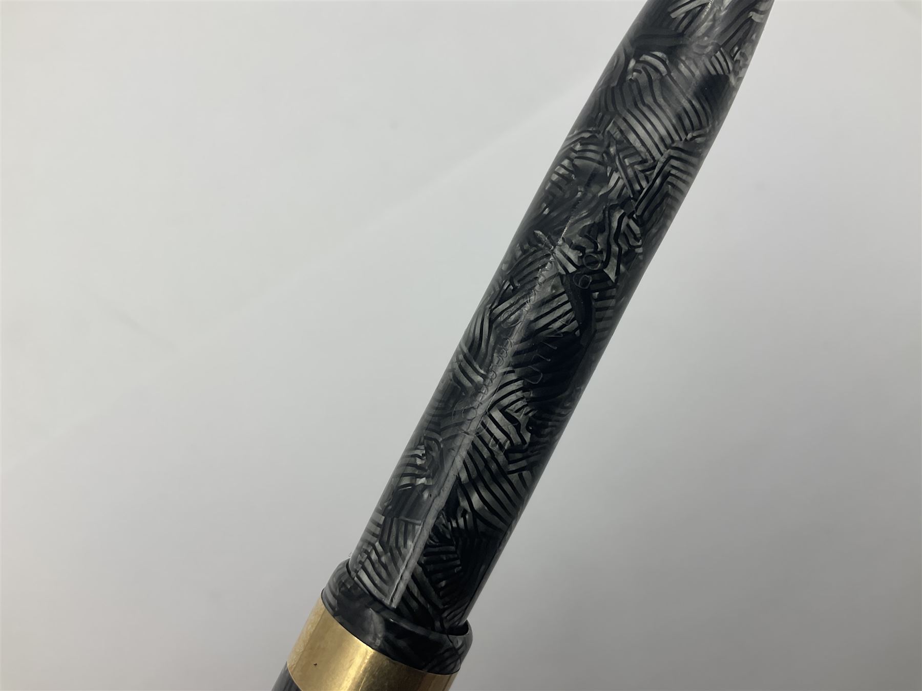 Conway Stewart Executive 60 fountain pen, the barrel and cap with hatched grey and black marble decoration and gold nib stamped Duro 14ct, together with a Conway Stewart 58 fountain pen similarly decorated in pearl blue and black with gold nib stamped 14ct, largest 13cm (2)