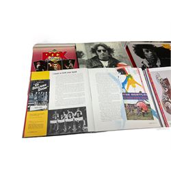 Two novelty framed LP wall clocks; two books containing replica memorabilia and CDs on John Lennon and Jimi Hendrix; Rock Review booklet; and book on Cliff Richard entitled 'Cliff In His Own Words' (6)