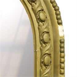 Large Country House late 19th century gilt framed overmantel mirror of arched form, the cartouche and scallop shell pediment over an egg-and-dart and beaded frame, the lower spandrels of scrolling foliate form with acanthus and flower head motifs