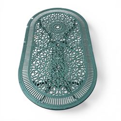 Cast aluminium oval garden table and set of four armchairs with pierced rose design back splats