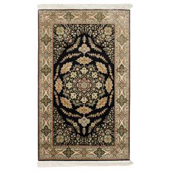 Persian-inspired Qom-style silk rug, deep indigo ground, profusely decorated with foliate ...