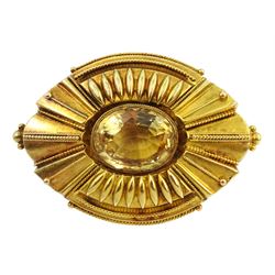 Victorian Etruscan revival gold brooch set with an oval citrine
