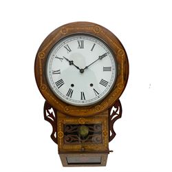 An American late 19th century oak and mahogany drop dial wall clock by Chauncey Jerome & Sons, with inlaid parquetry, fully glazed tablet door with fretwork and visible pendulum, sloped base with silk backed fretwork, 17” wooden bezel and 12” painted steel dial, Roman numerals, minute track and original steel Maltese hands, spun brass bezel with a flat glass and sight ring, 8-day striking movement, striking the hours on a bell.   
	

