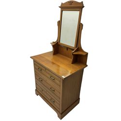 Edwardian satin walnut dressing chest, raised bevelled mirror back, the base fitted with three drawers