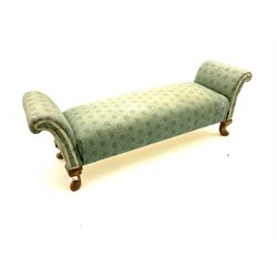 Victorian style footstool, scrolling arms and seat upholstered in blue patterned fabric, raised on carved cabriole supports 