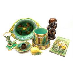 Treacle glazed toby jug, Victorian Majolica bamboo moulded planter and stand, Majolica two handled dish, a pottery plaque relief moulded with a courting couple and a Majolica preserve pot in the form of a pear 