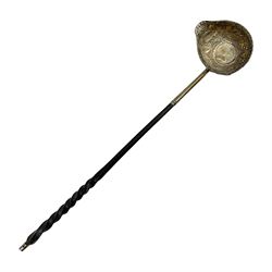 Silver toddy ladle, the bowl set with a Anne 1710 silver shilling coin on a balleen twist handle, L33cm