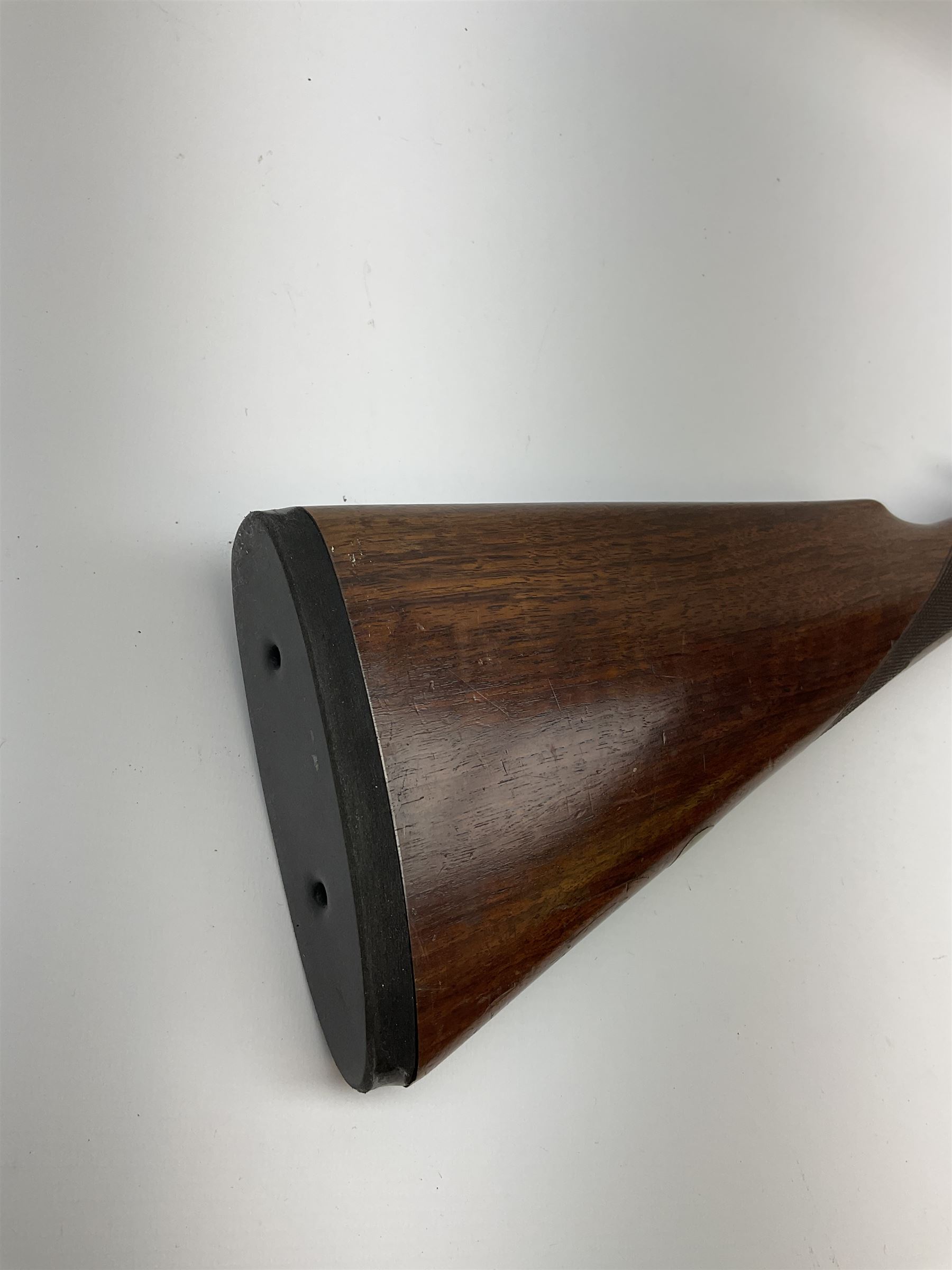 Harrods Ltd. Brompton Road London (Retailer) 12-bore side-by-side boxlock non-ejector sporting gun, 75cm barrels, walnut stock with chequered grip and fore-end and thumb safety, serial no.015, L118.5cm overall SHOTGUN CERTIFICATE REQUIRED