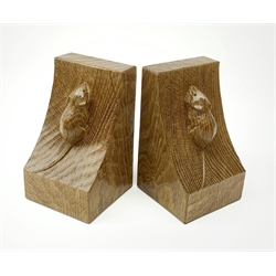 'Mouseman' pair adzed oak bookends by Robert Thompson of Kilburn, carved mouse signature to each end, H16cm