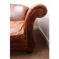  Laura Ashley three seat dark tan leather sofa, scrolled arms, bun feet, W218cm  