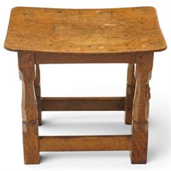Mouseman - mid-20th century adzed oak joint stool, dished oak seat, on shaped octagonal supports joined by box stretcher, with carved mouse signature, by the workshop of Robert Thompson of Kilburn