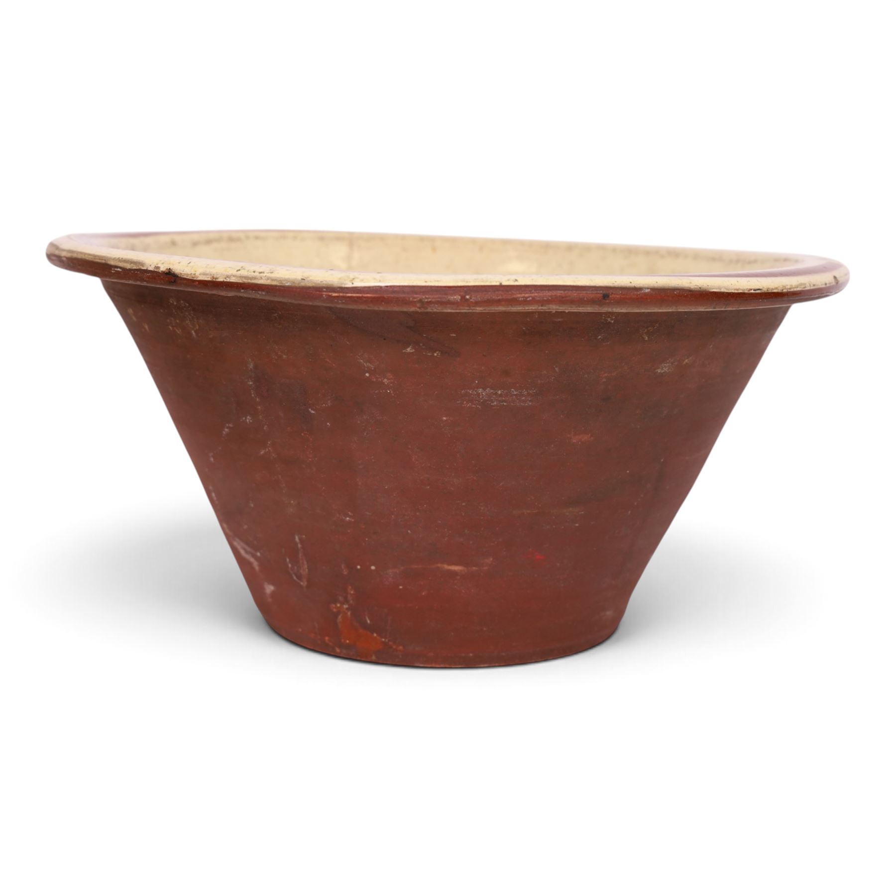 19th century pancheon, of tapering circular form, the glazed interior with slip decoration H20cm, D42cm 