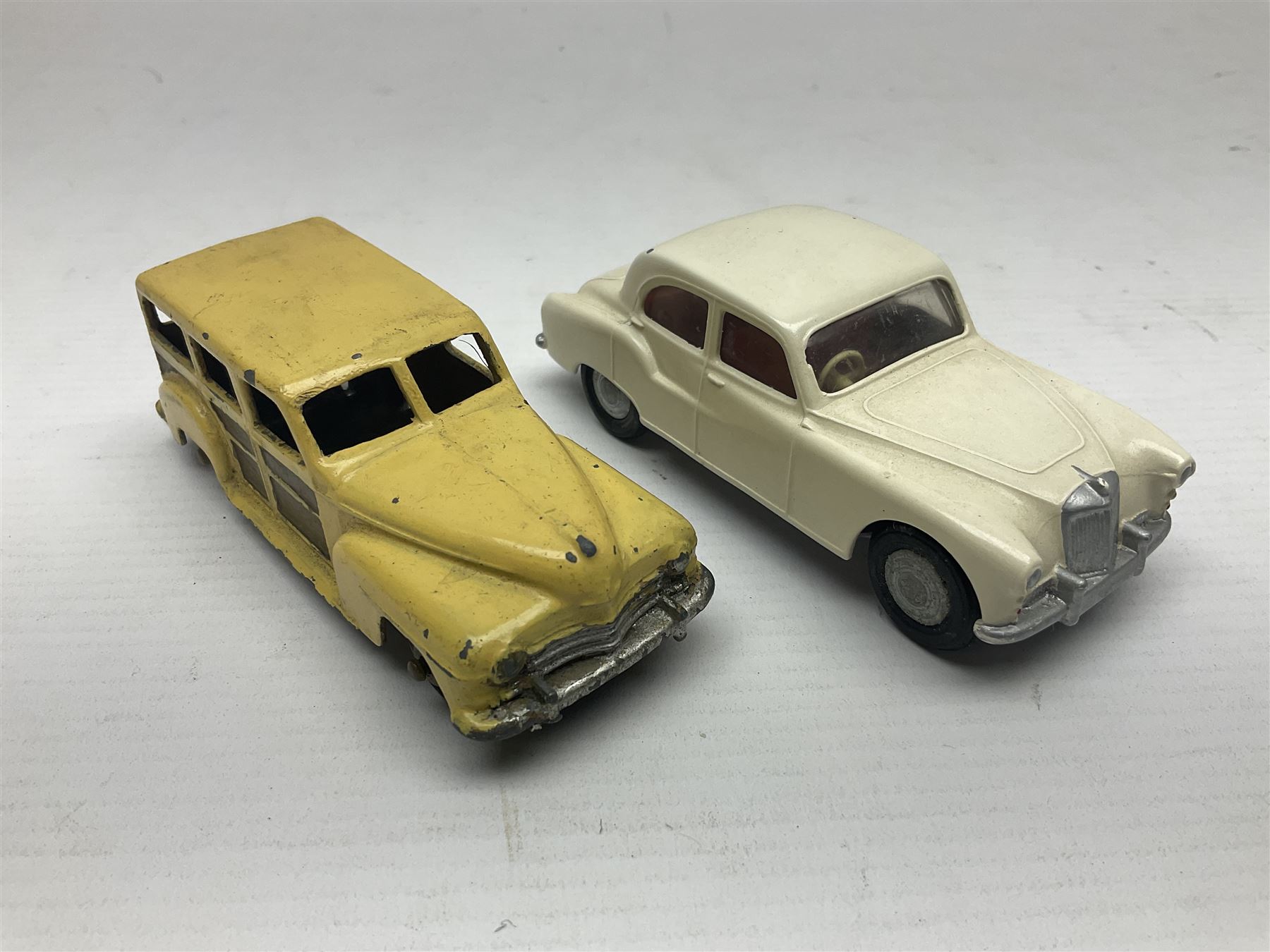 Eleven unboxed and playworn early die-cast models including Dinky Packard, Buick, two Jaguar Mark X and estate wagon, Corgi Mercedes-Benz 300S.L. Roadster, Ford Thunderbird, Citroen DS19 and Bentley Continental Sports Saloon, Spot-On Armstrong Siddeley Sapphire etc; all unboxed (11)