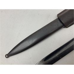 WWII German K98 Mauser bayonet by E. & F. Horster, the 24.5cm fullered blade marked 43aSW for 1943, numerous inspection marks to blade and pommel, bakelite grips and bluing to metal parts; in steel scabbard with corresponding numbers and leather frog L42cm overall