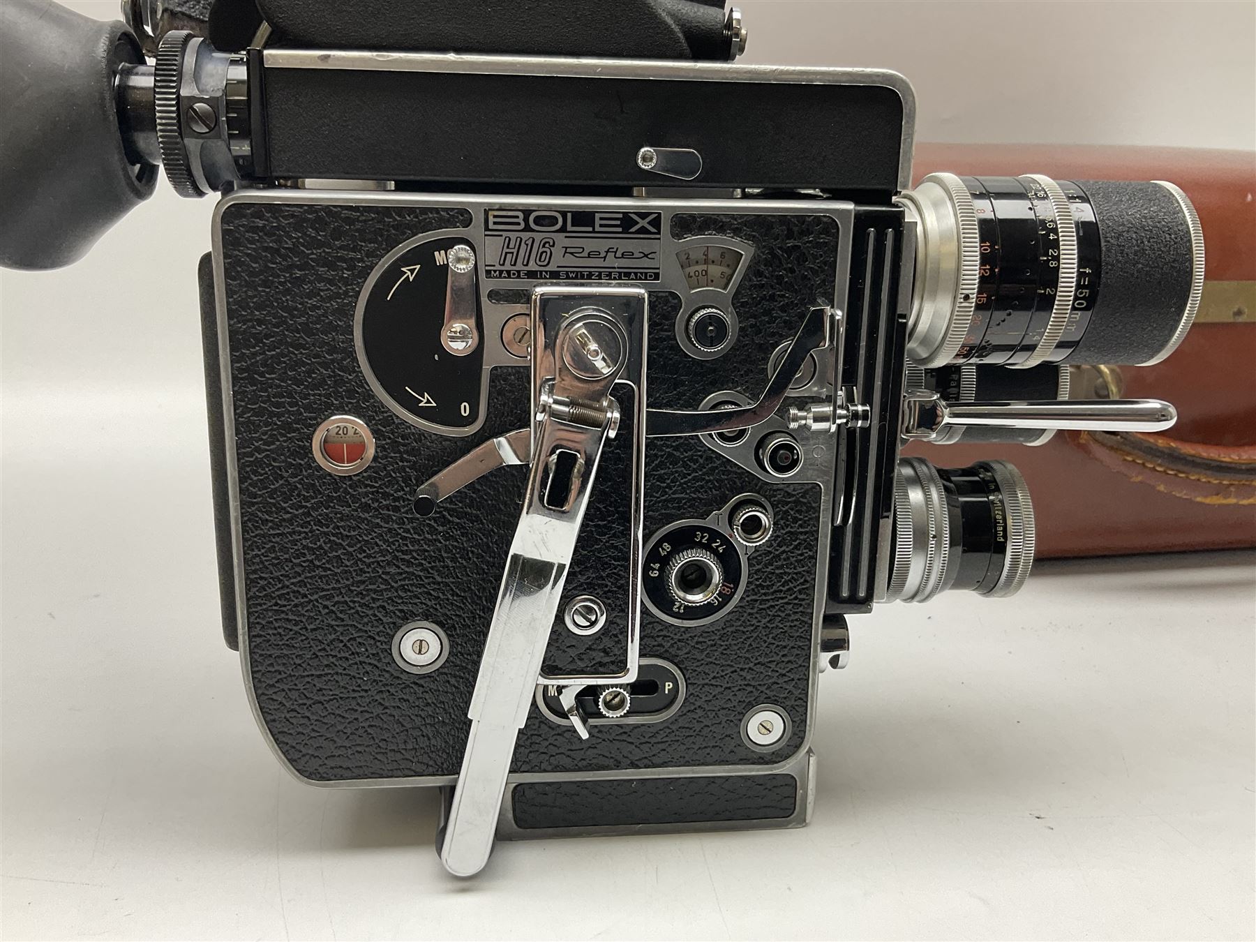 Paillard Bolex H16 RX5 cine camera body with turret for interchangeable lenses, serial no. 232492, with 'Switar H16RX 50mm f1.4' lens, serial no. 667880, 'Switar H16RX 25mm f1.4' lens, serial no.675510, 'Switar H16RX 16mm f1.8' lens, serial no. 884046 and RX fader, in fitted leather carrying case