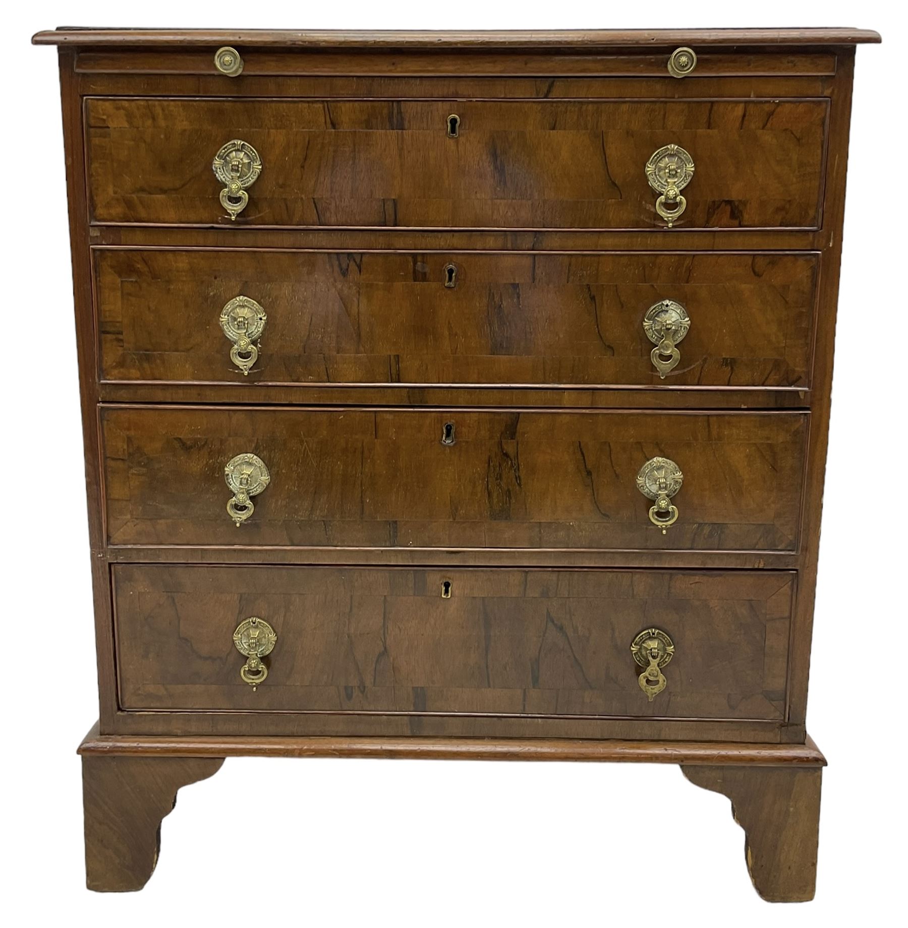 Georgian design walnut chest, crossbanded rectangular ovolo-moulded top, fitted with slide over four long cock-beaded drawers, on bracket feet