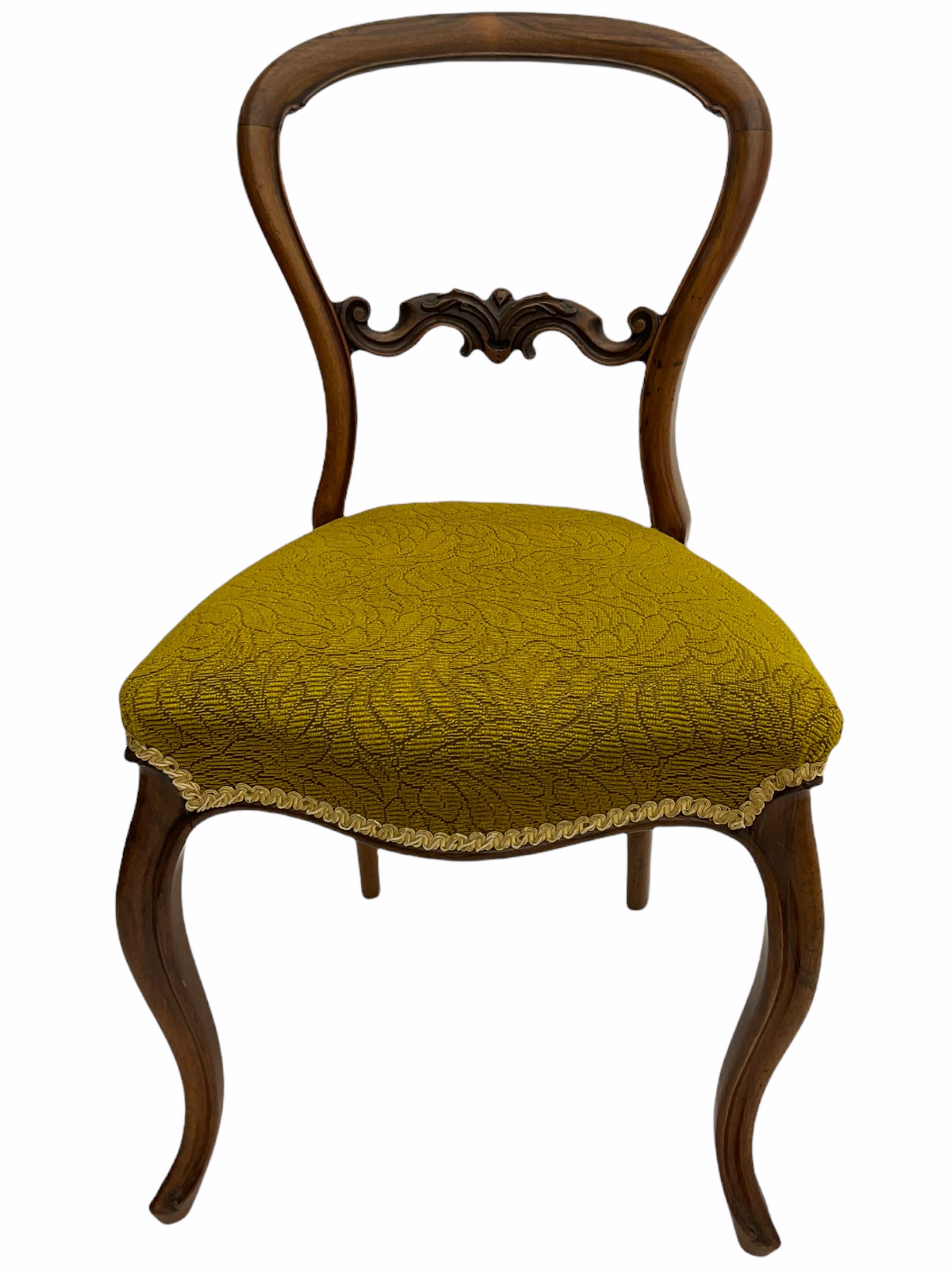 Set of four Victorian rosewood chairs, serpentine seats with horsehair